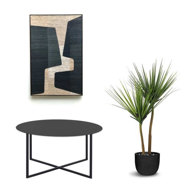 Mesa de centro metálica negra Talsi 80×45 ambientada con un cuadro y una planta con fondo blanco