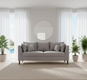 sofá en un living con alfmombra y espejo de fondo